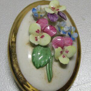 vintage oval brooch with porcelain 3D flowers unmarked